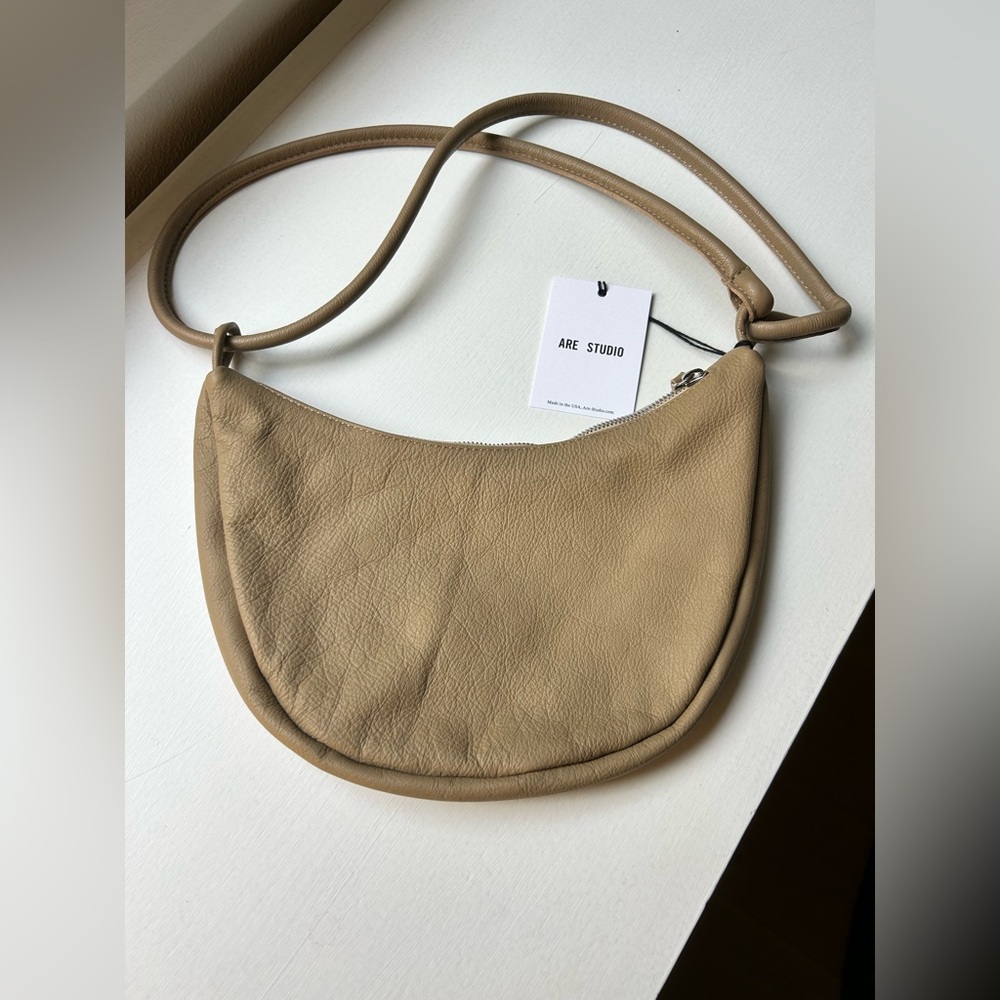 Are studio Bow Bag in dust. Brand new never used!
